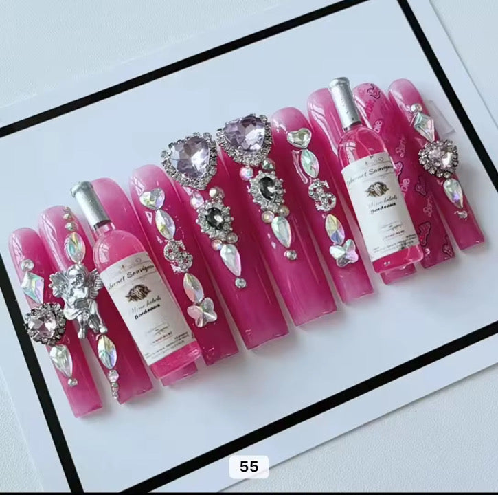 Pink acrylic press on nails with champagne