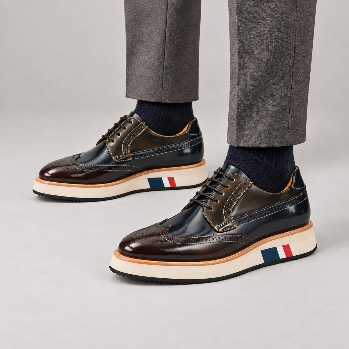 Brown and Black Wingtip Derby Shoes with Striped Sole