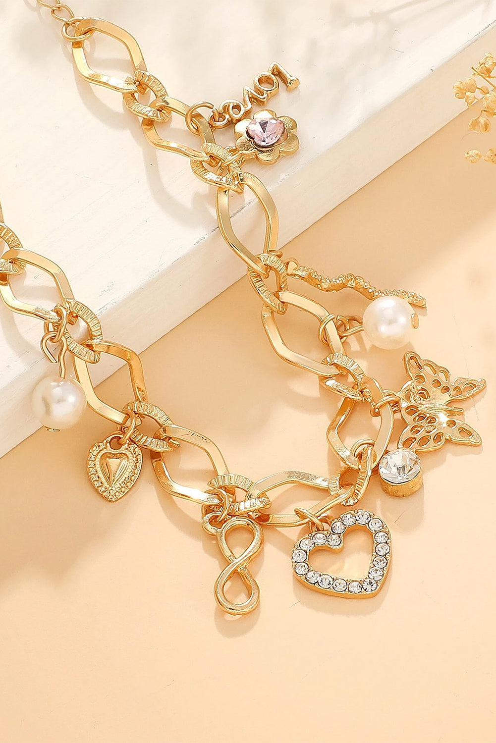 Pulsera con dije de mariposa RTS