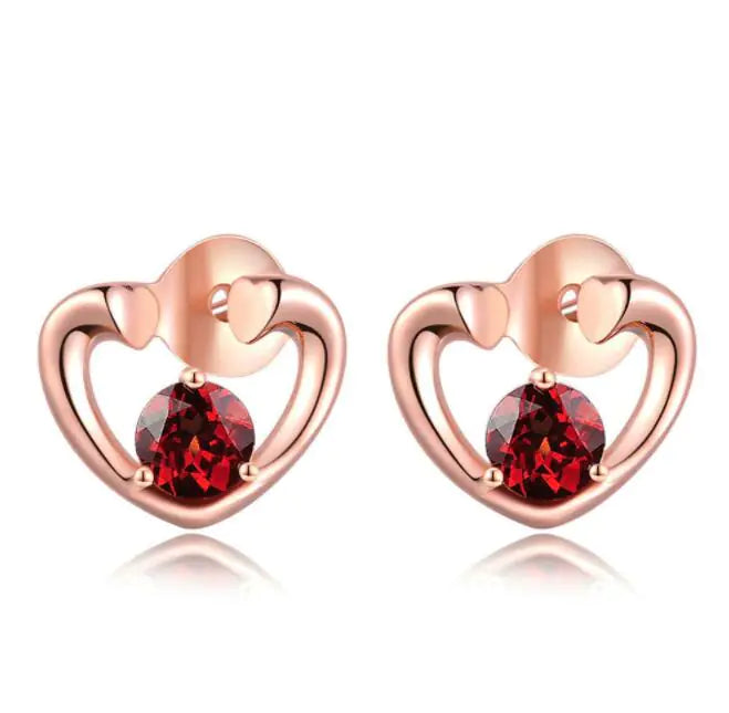 Aretes de gema en oro rosado de plata 925