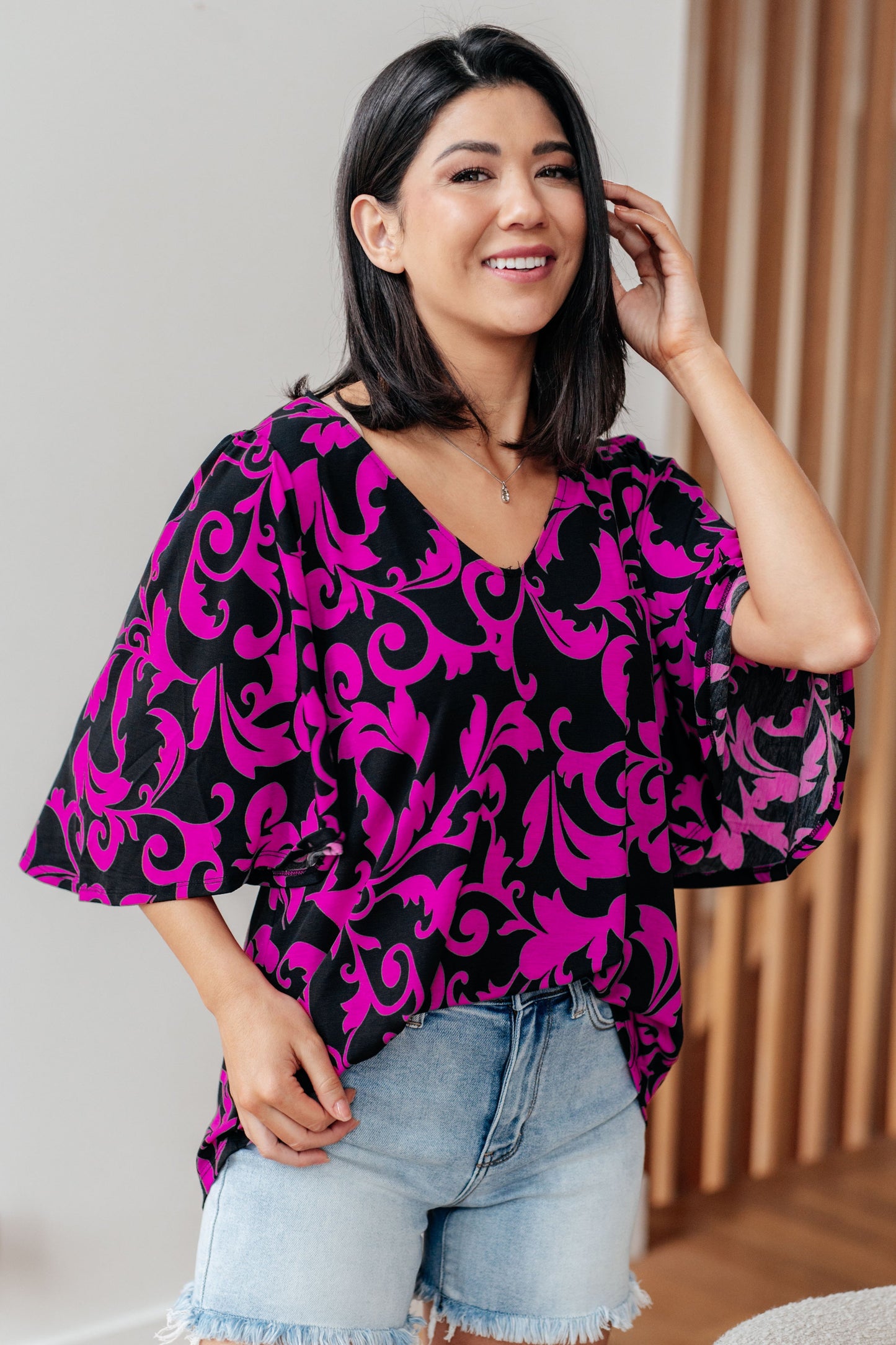 Top escote en V lindo e informal en magenta
