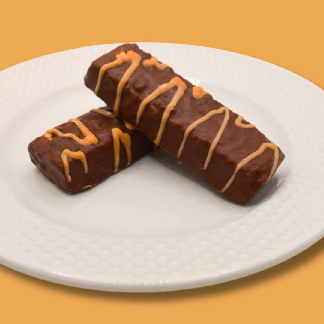 Barritas de chocolate, caramelo y oblea