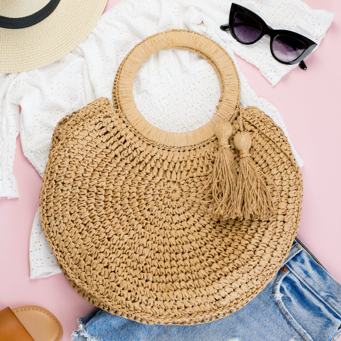 Bolso tote con borla y argolla