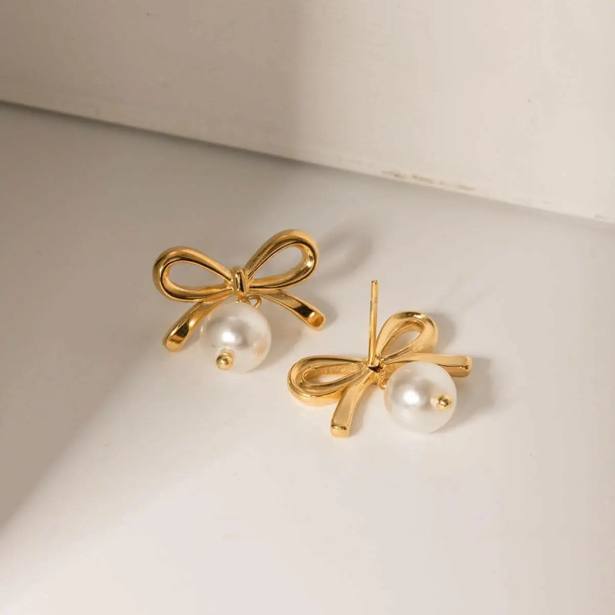 Pendientes de lazo de perlas de Trendsi - Estilo elegante y delicado para mujer