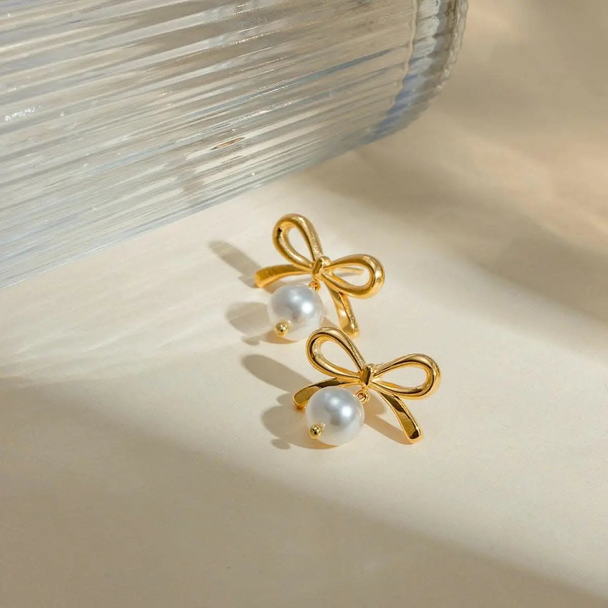 Pendientes de lazo de perlas de Trendsi - Estilo elegante y delicado para mujer