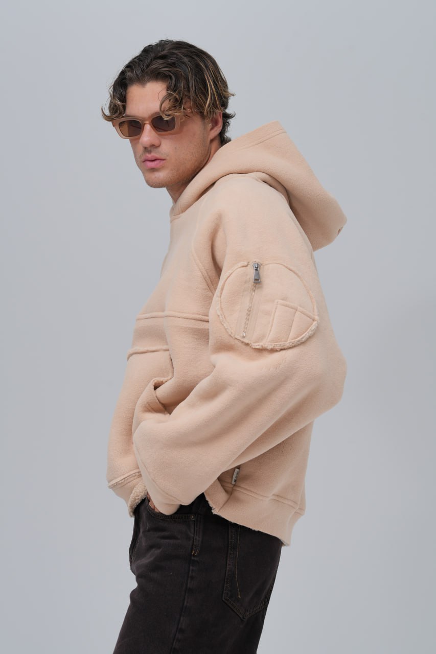 Sudadera polar con costuras expuestas