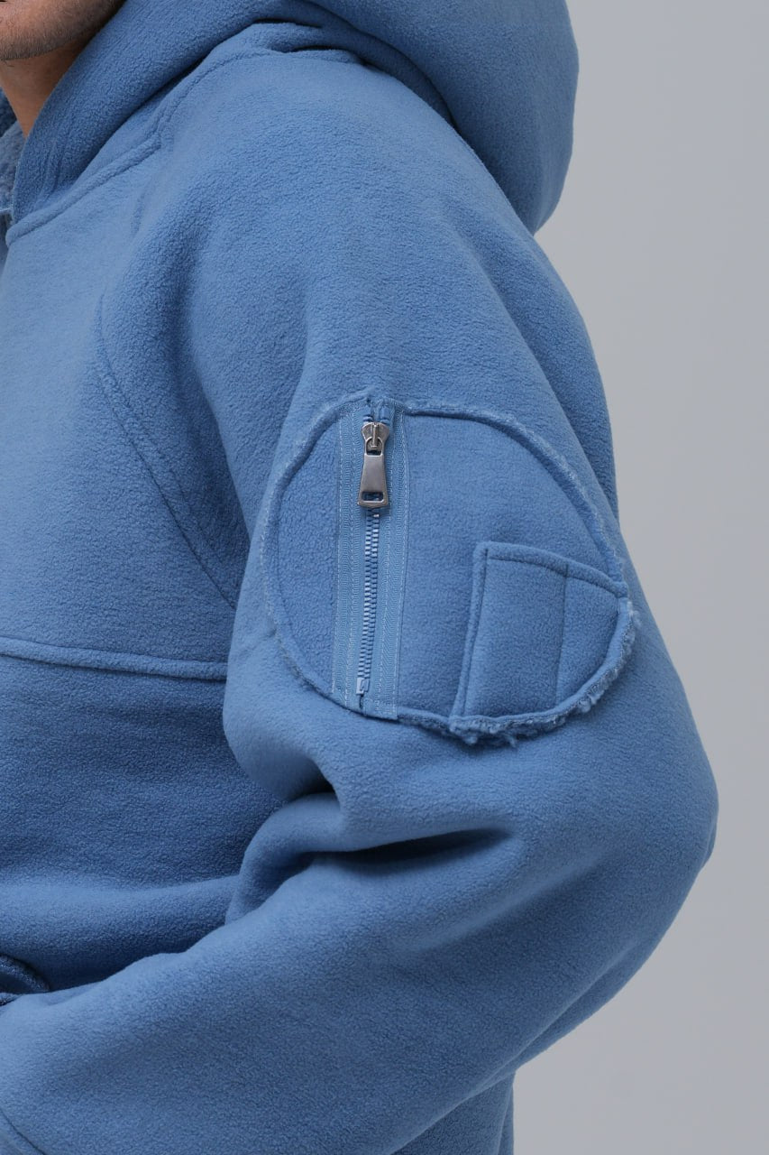 Sudadera polar con costuras expuestas