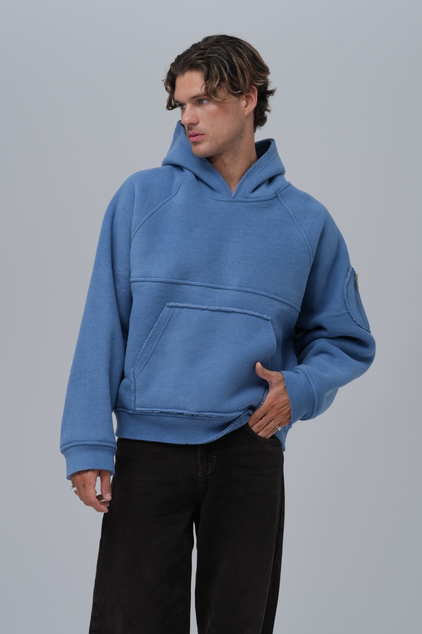 Sudadera polar con costuras expuestas