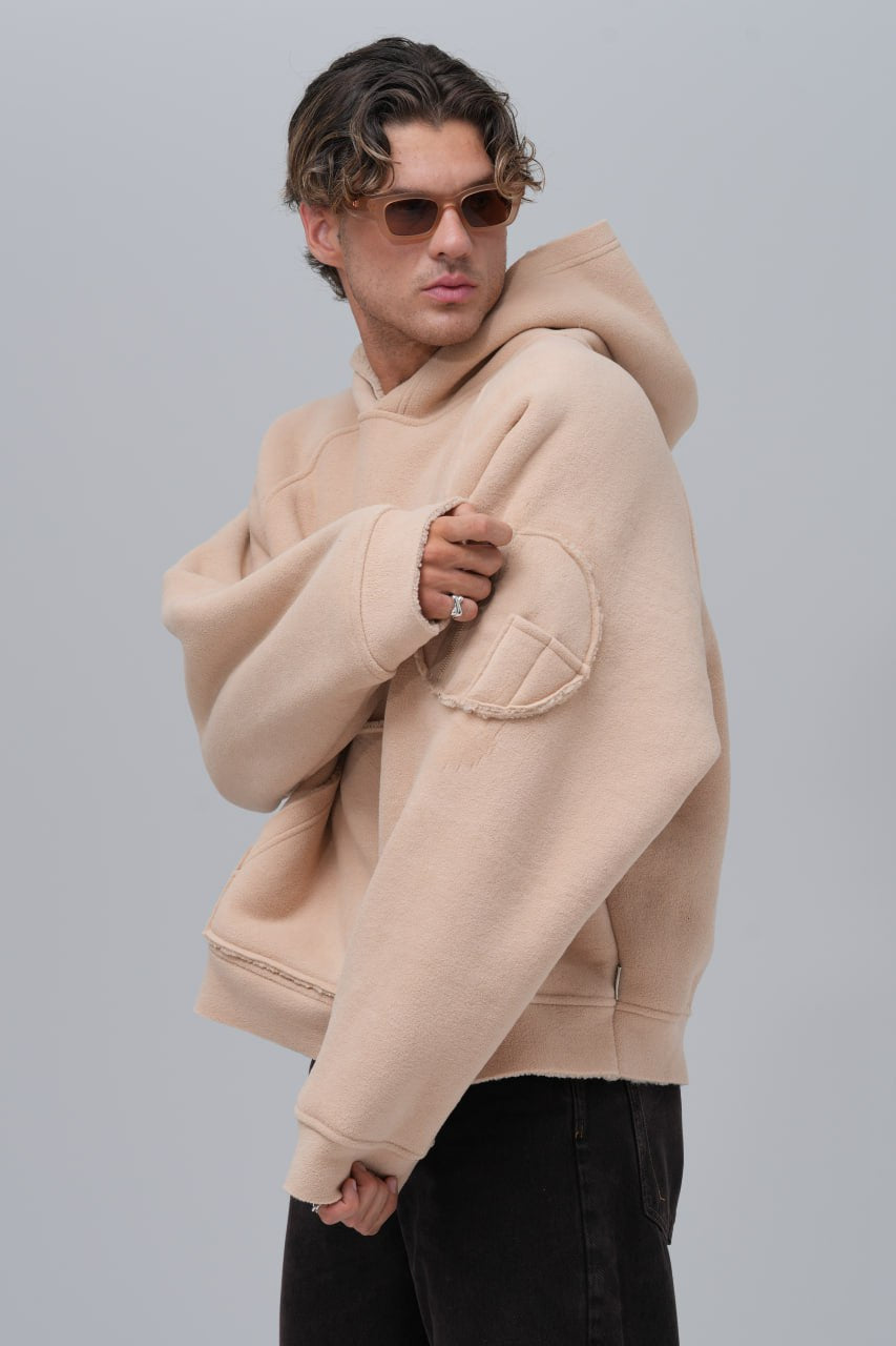 Sudadera polar con costuras expuestas