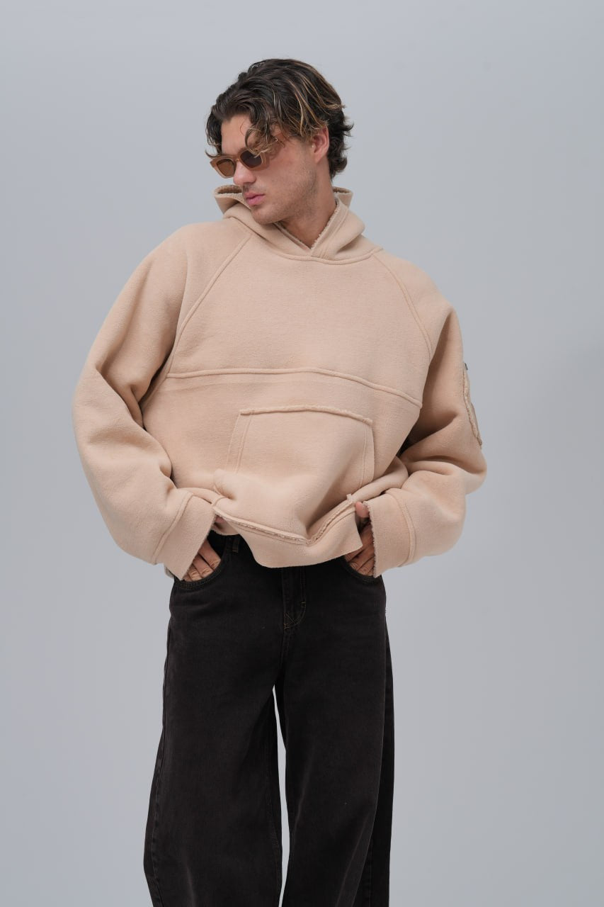 Sudadera polar con costuras expuestas