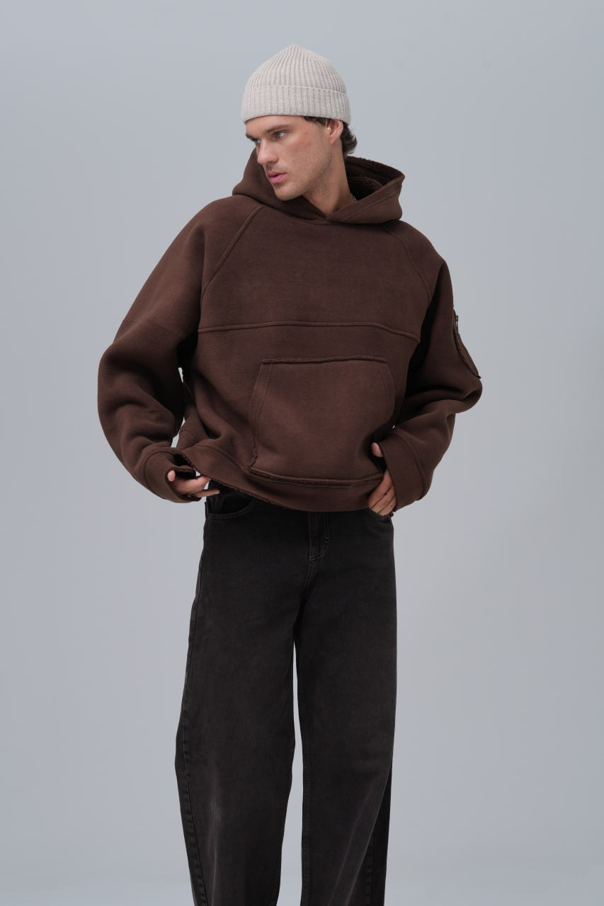 Sudadera polar con costuras expuestas
