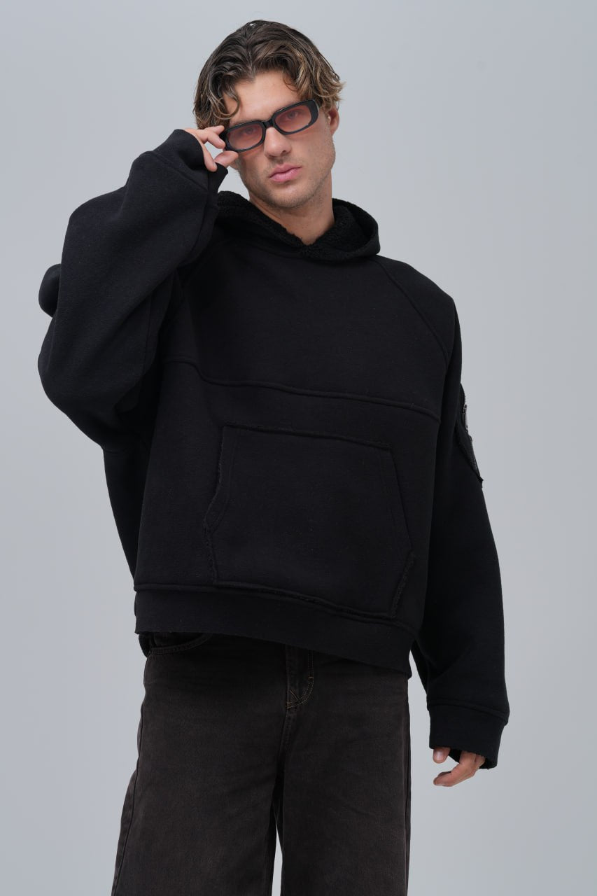 Sudadera polar con costuras expuestas