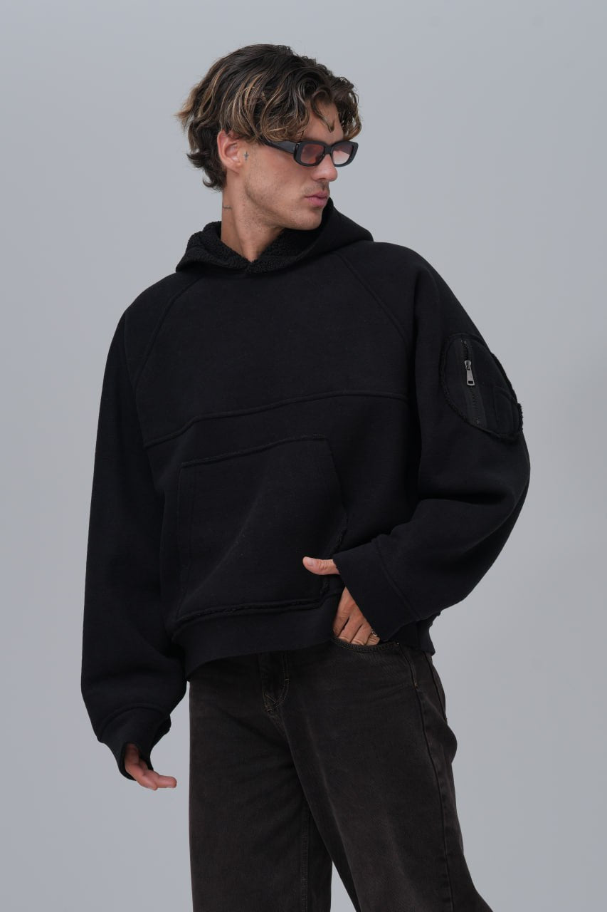 Sudadera polar con costuras expuestas