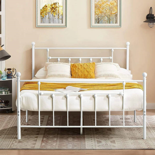 Cama con estructura de metal blanco de estilo vintage con cabecero y pie de cama