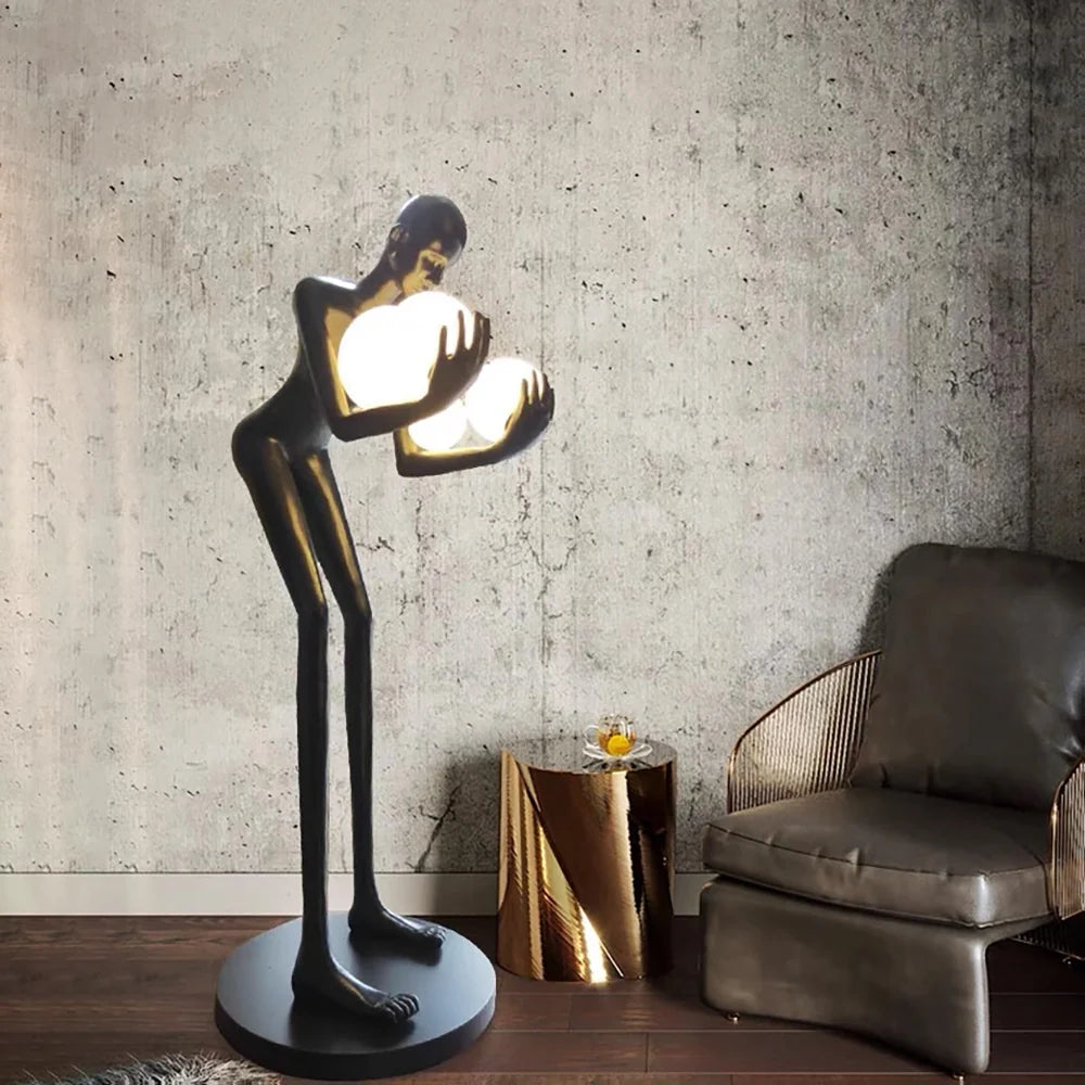 Lámpara de pie de escultura Figura Sosteniendo Bola