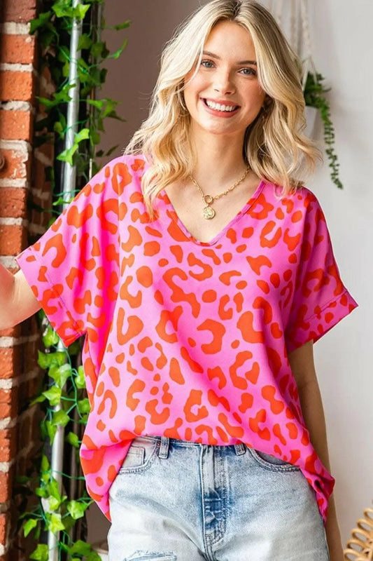 Vestidos Tendencia Primera Blusa Tejida de Manga Corta con Cuello en V y Estampado de Leopardo