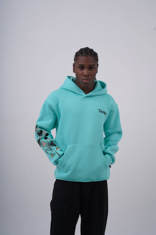 Sudadera con capucha bordada con manga floral