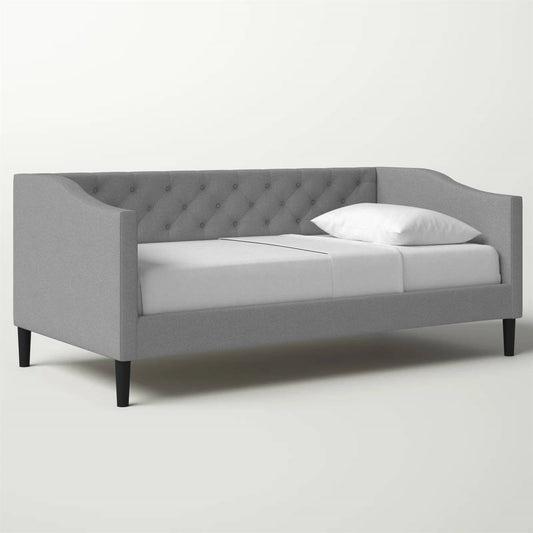 Sofá cama tapizado en tela gris moderna con botones capitoné, tamaño individual