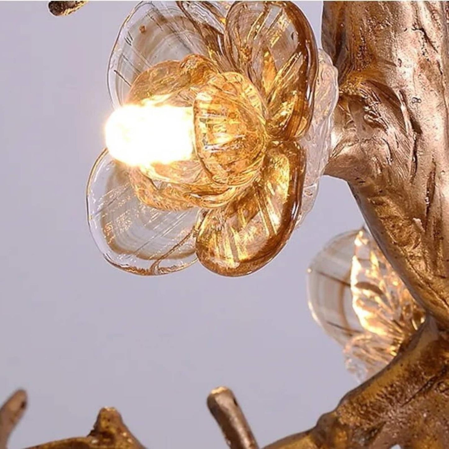 Lámpara de araña de rama de árbol con flores de cristal