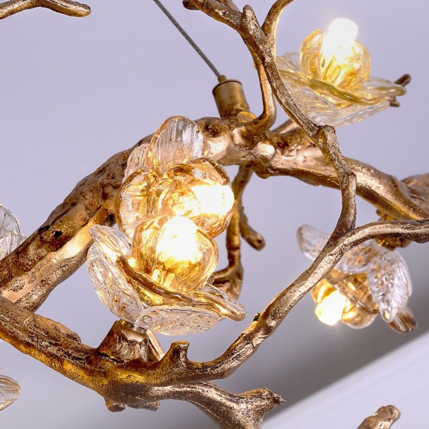 Lámpara de araña de rama de árbol con flores de cristal