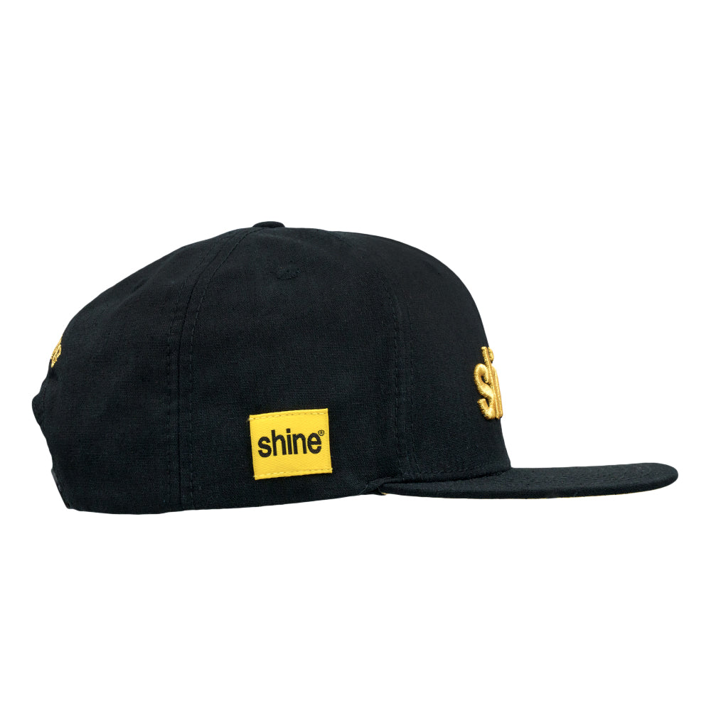 Gorra "Shine Black Gold" con cierre trasero a presión