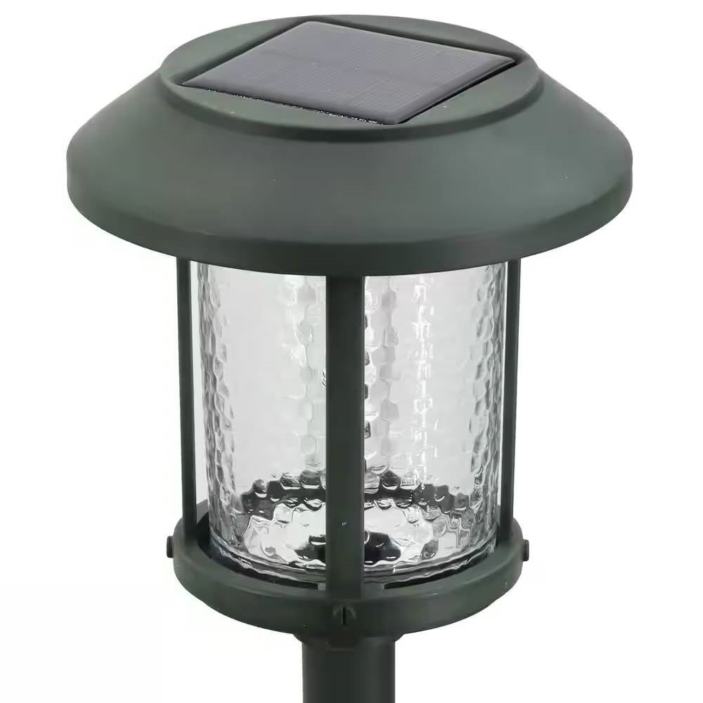 Juego de 4 luces LED solares para exteriores en verde con estacas de tierra para jardín