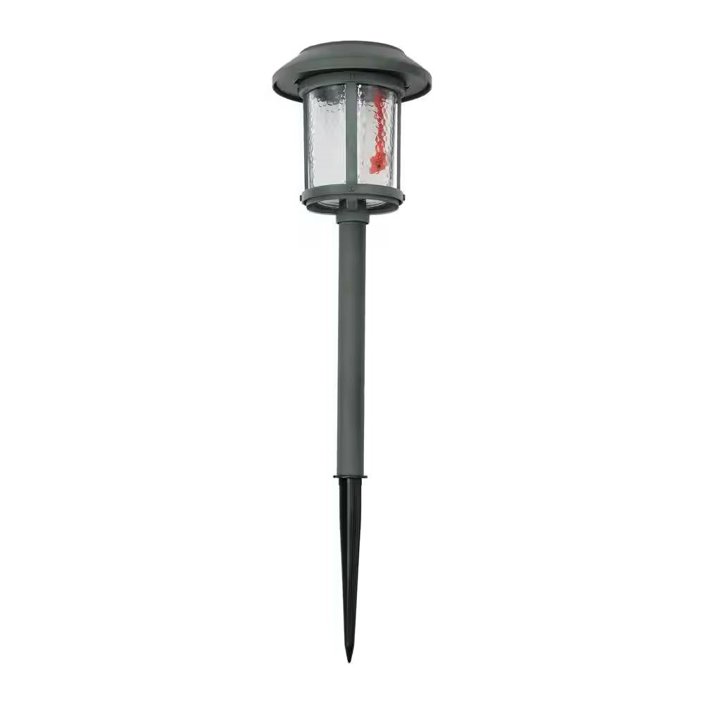 Juego de 4 luces LED solares para exteriores en verde con estacas de tierra para jardín