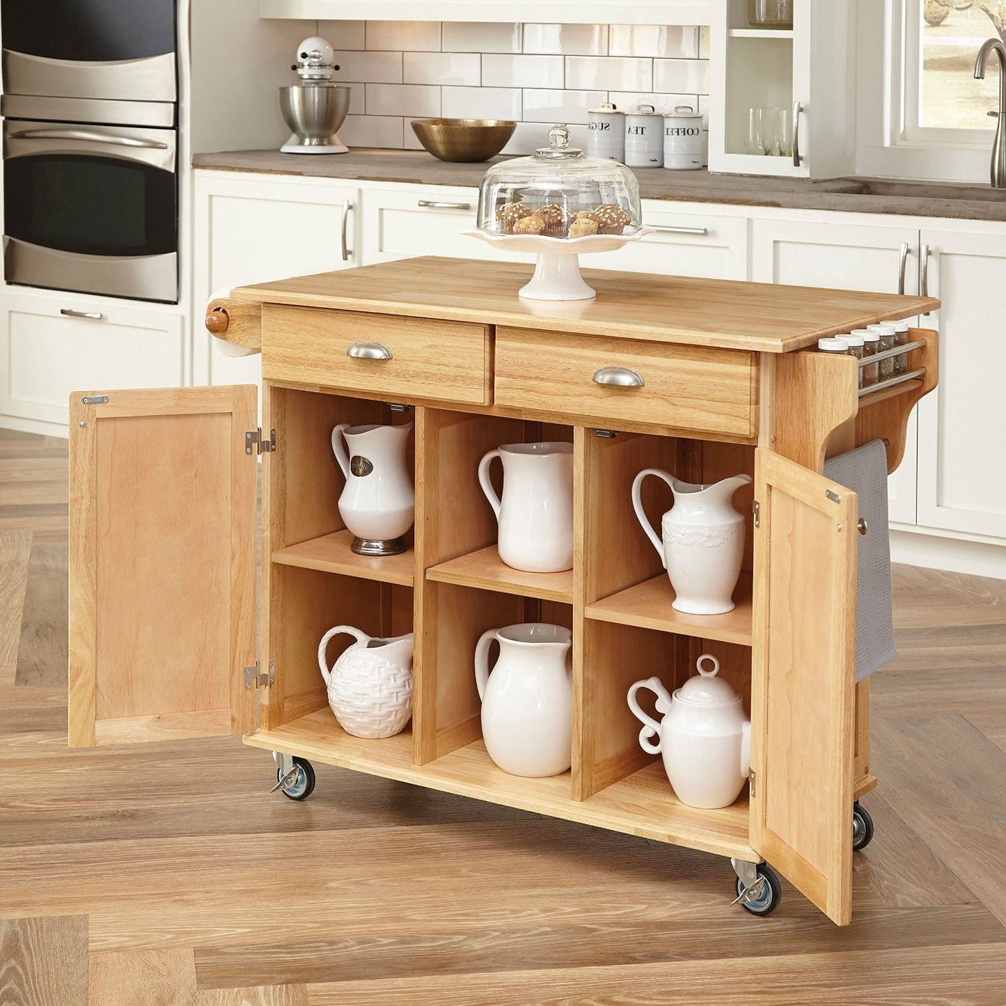 Carrito de isla de cocina con acabado de madera natural y ruedas con freno