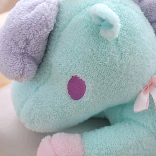 Peluche de unicornio en tonos pastel