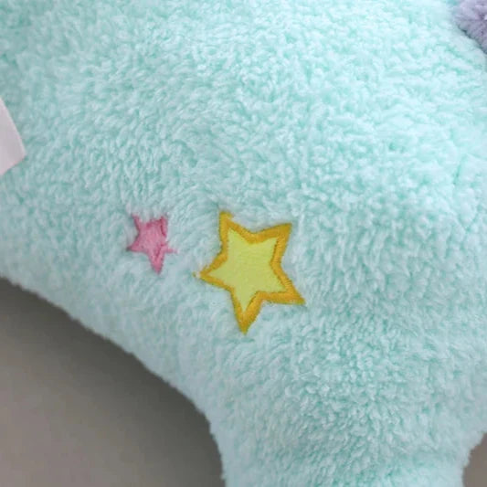 Peluche de unicornio en tonos pastel
