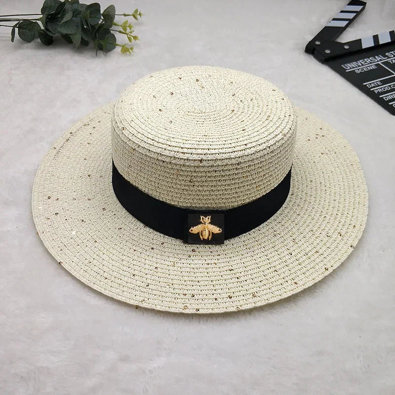 Canotier de paja para mujer con adorno de abeja metálica