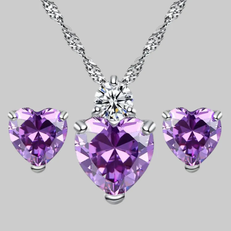 Conjunto de pendientes y collar con circonitas en forma de corazón