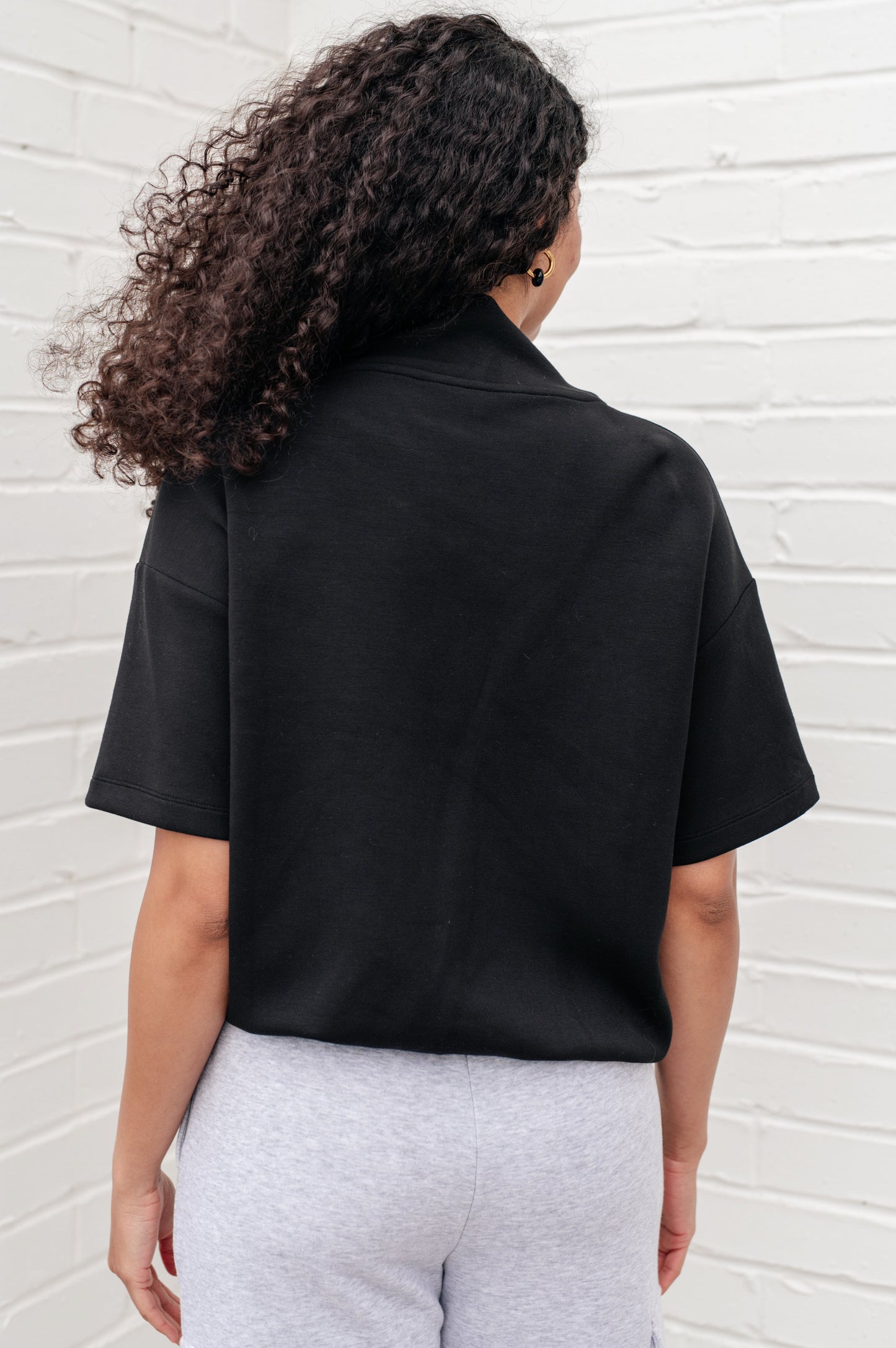 Top de cuello alto I Just Felt Like It en negro