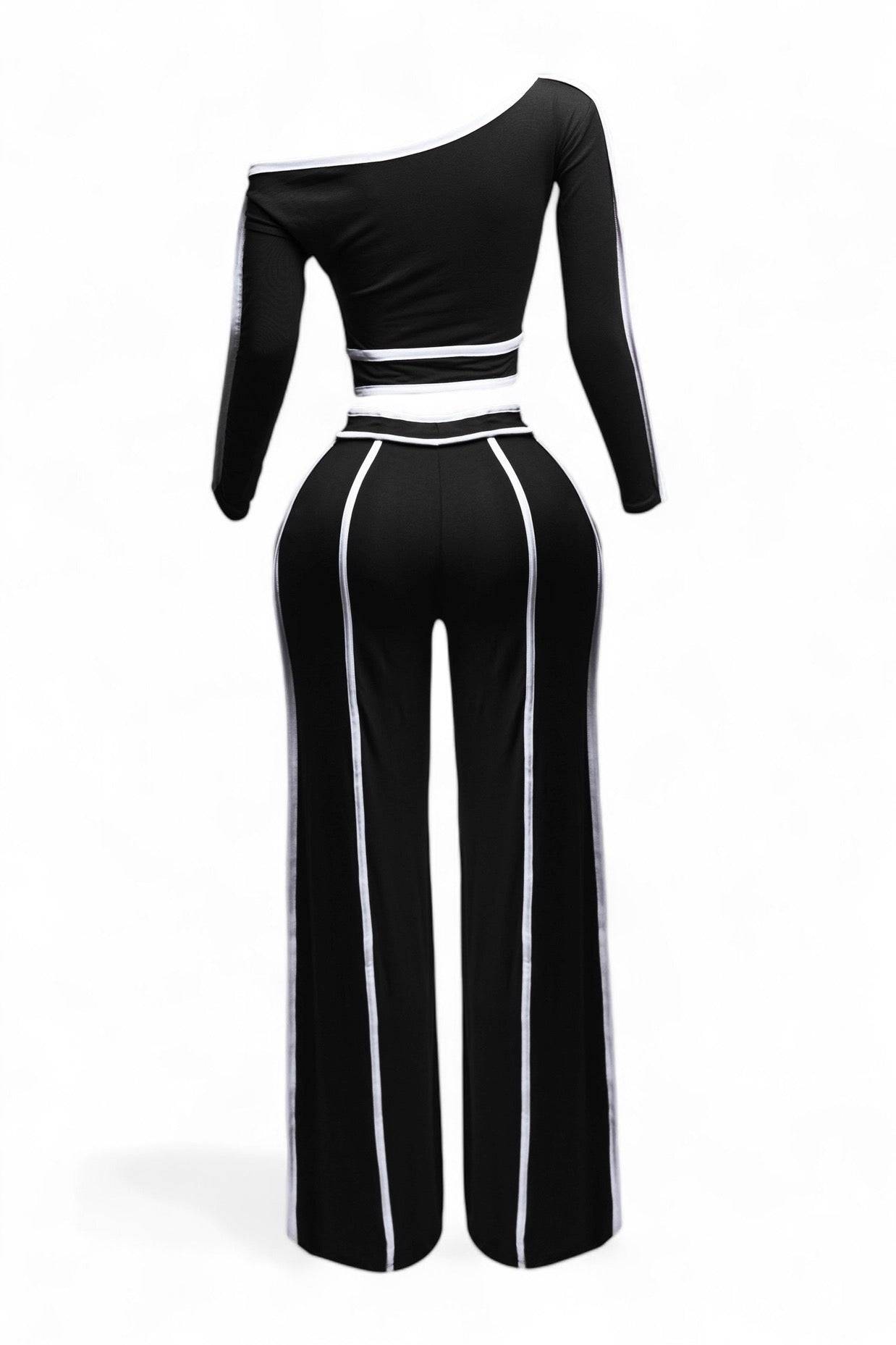 Top de manga larga con hombros descubiertos y pantalones de pierna ancha