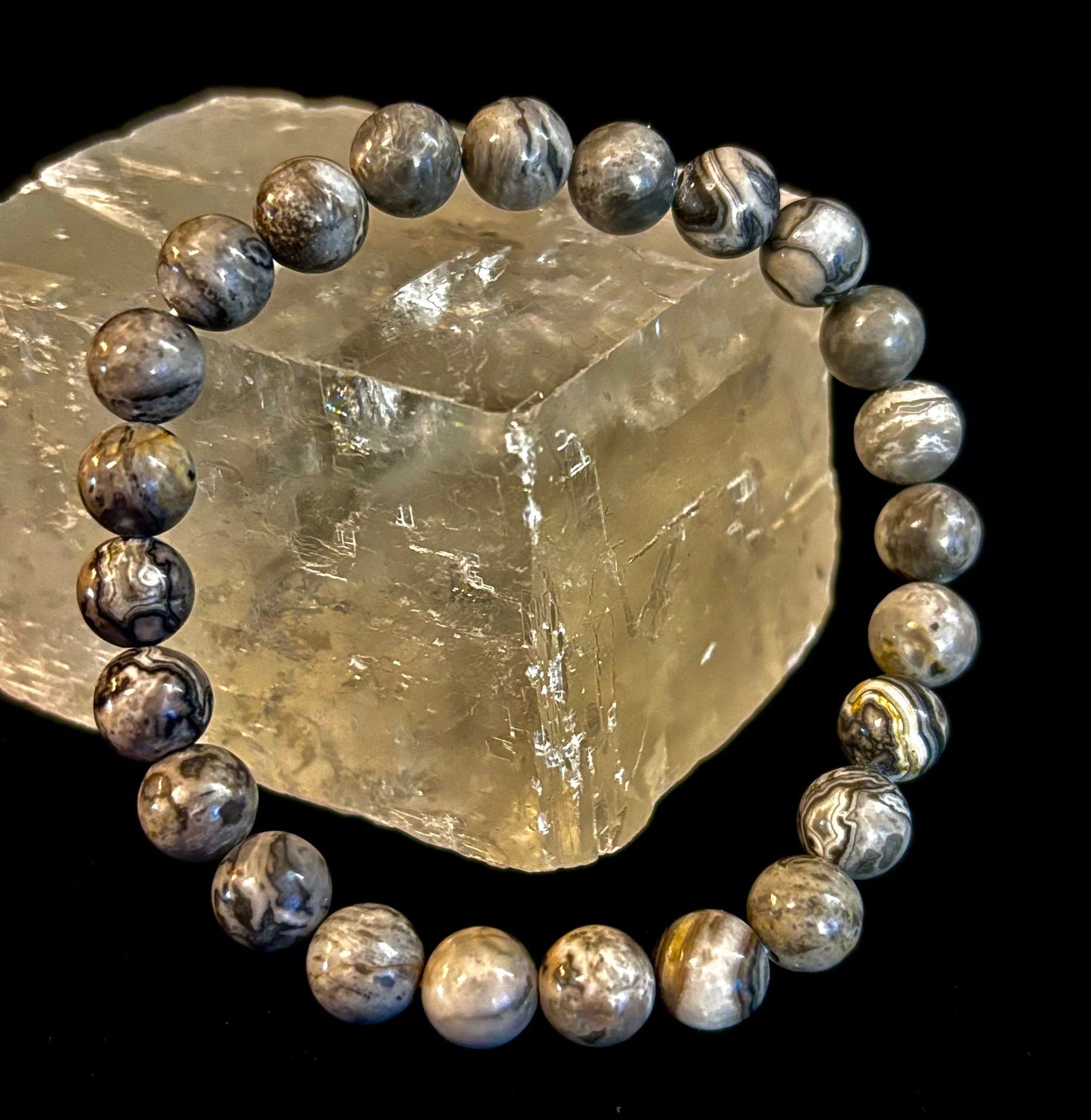 Pulsera de manifestación y conexión a tierra de jaspe de encaje ondulado de 8 mm con infusión de Reiki (muñecas medianas-grandes)