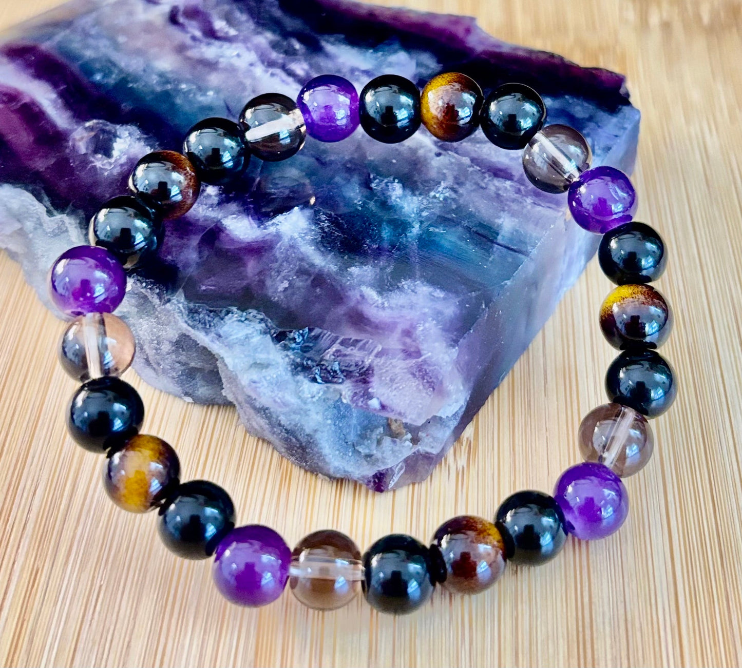 Pulsera Enfoque Tranquilo – Amatista, Ojo de Tigre y Cuarzo Ahumado
