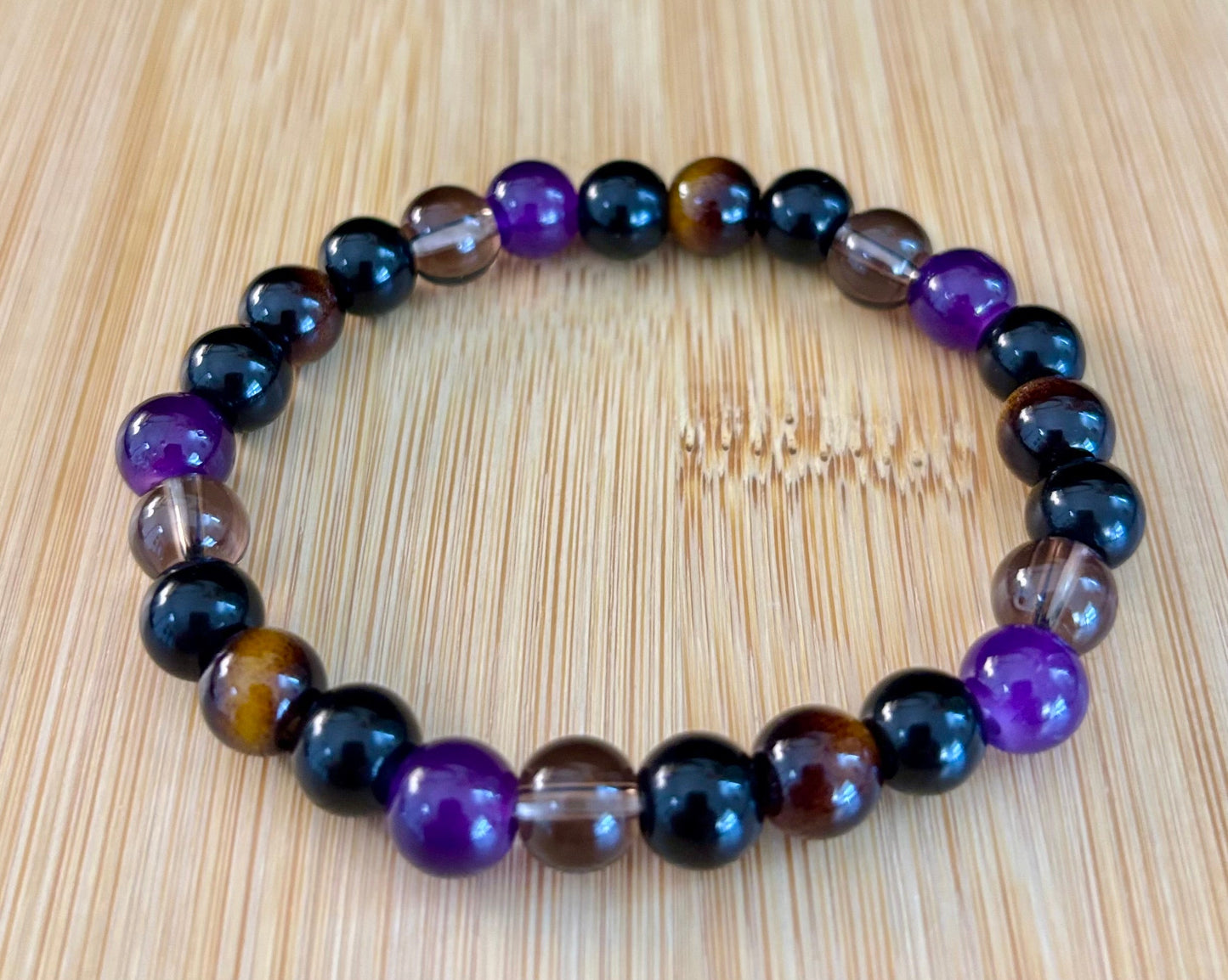 Pulsera Enfoque Tranquilo – Amatista, Ojo de Tigre y Cuarzo Ahumado