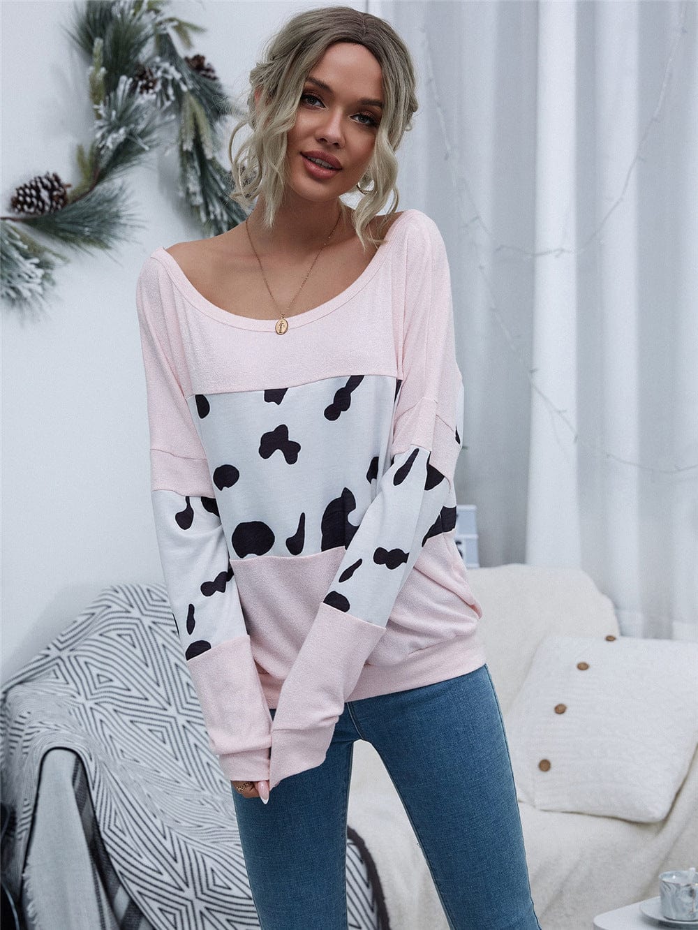 Suéter con bloques de color y estampado de vaca