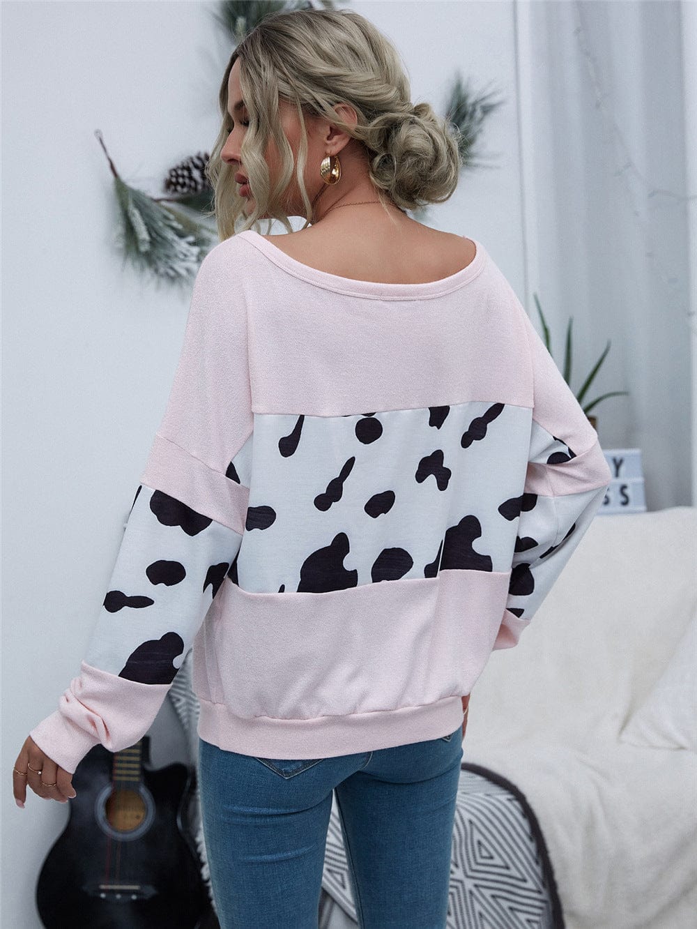 Suéter con bloques de color y estampado de vaca