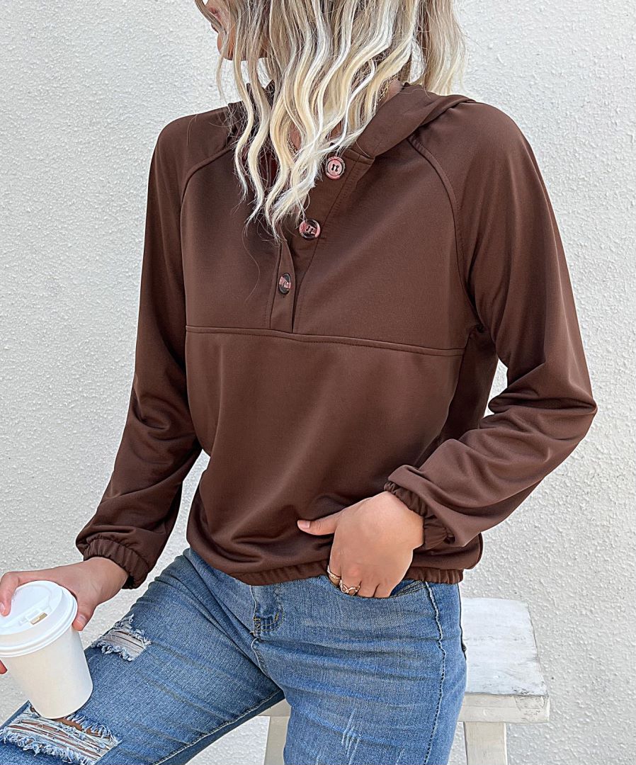 Sudadera con capucha y medio cierre de botones