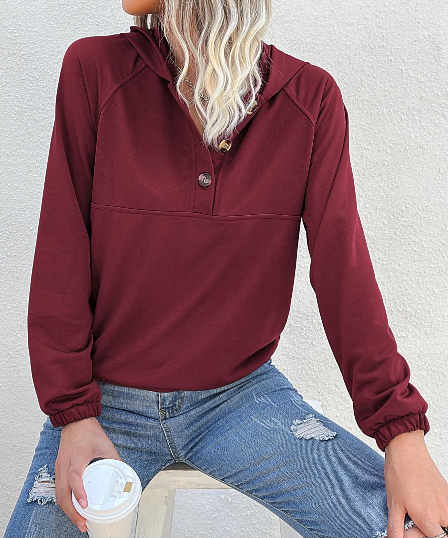 Sudadera con capucha y medio cierre de botones
