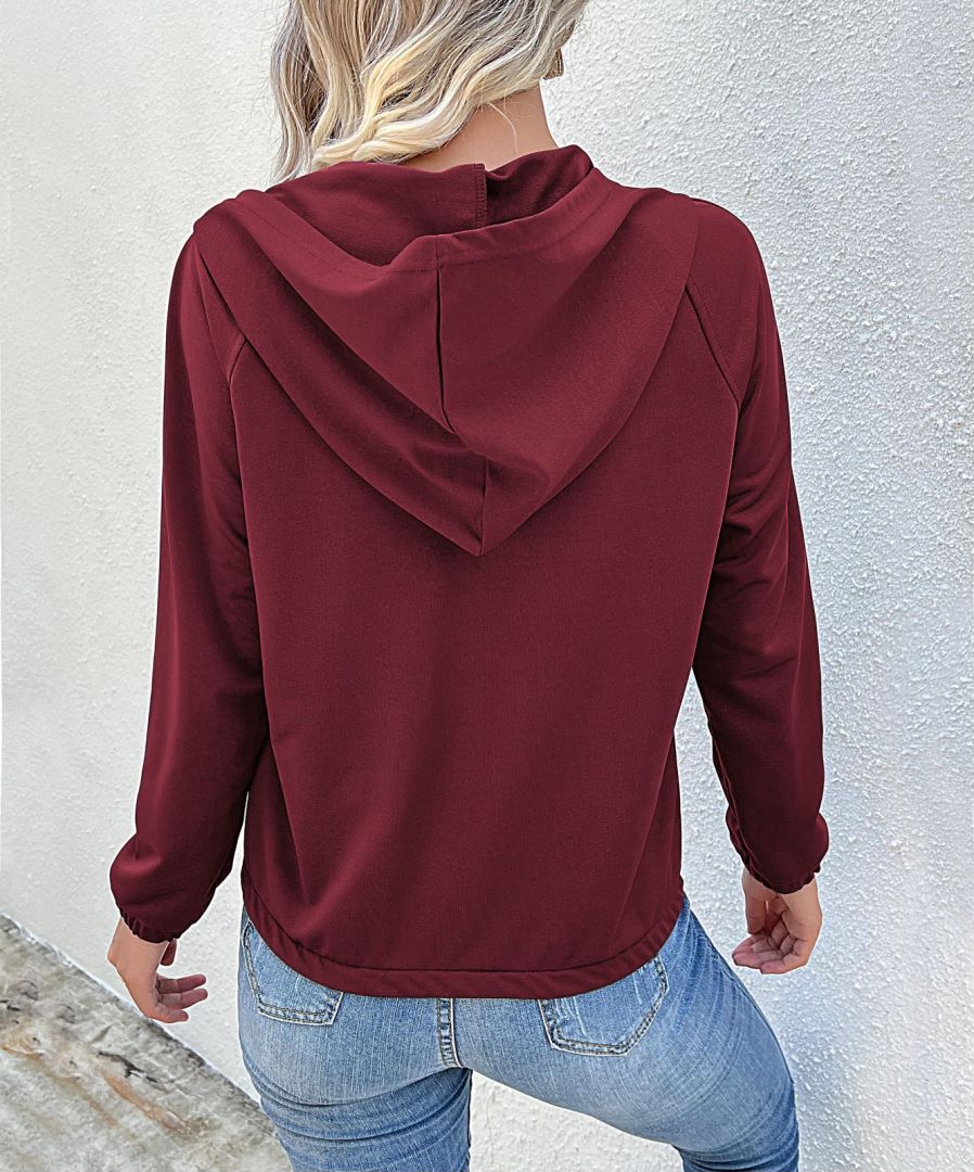 Sudadera con capucha y medio cierre de botones