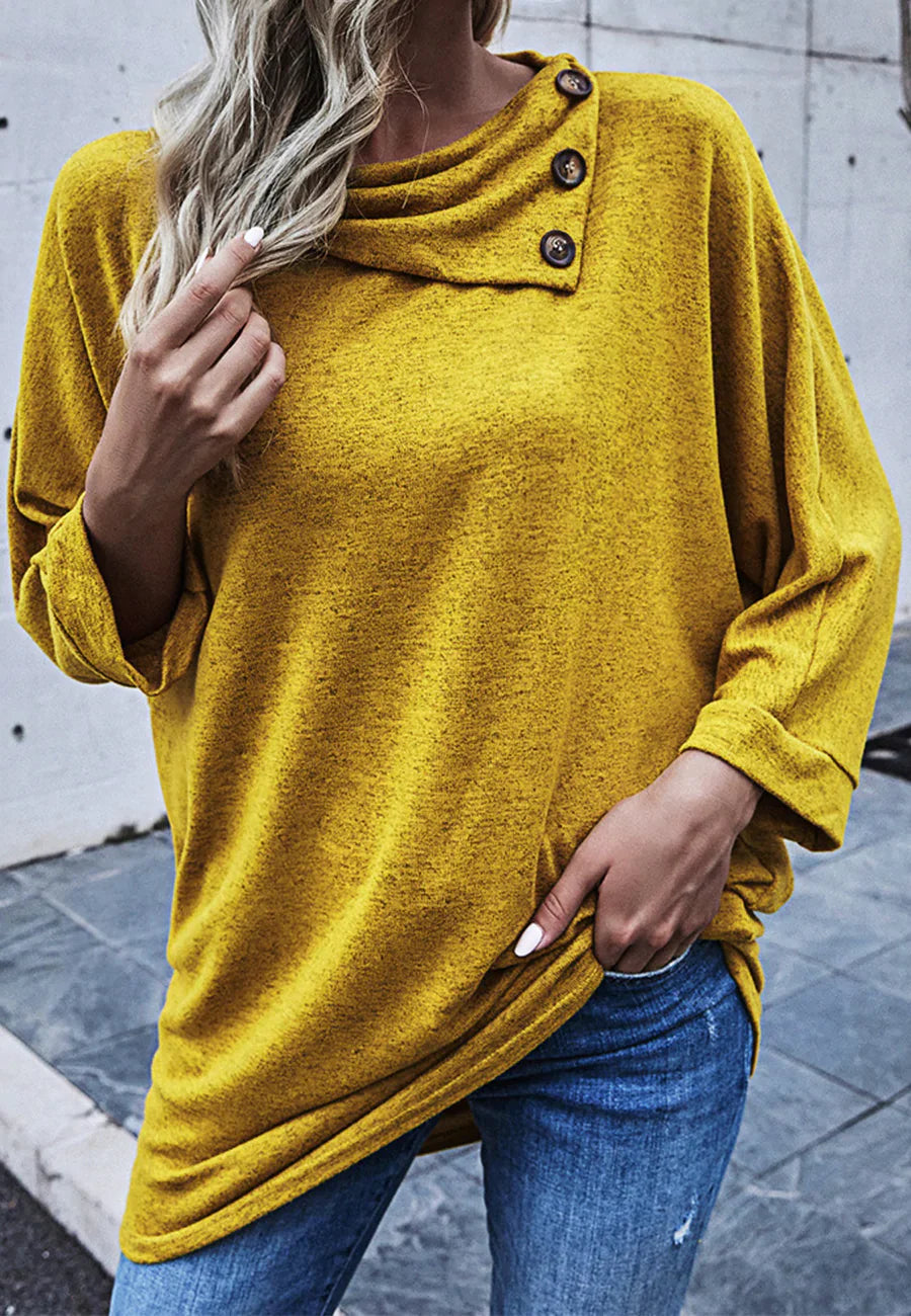 Jersey con cuello de botones asimétrico