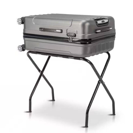Soporte plegable de metal negro resistente para equipaje