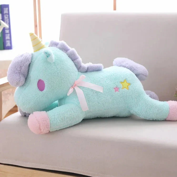 Peluche de unicornio en tonos pastel