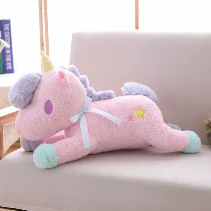 Peluche de unicornio en tonos pastel