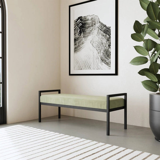 Banco de cama moderno industrial con estructura de metal negro y cojín de terciopelo verde salvia