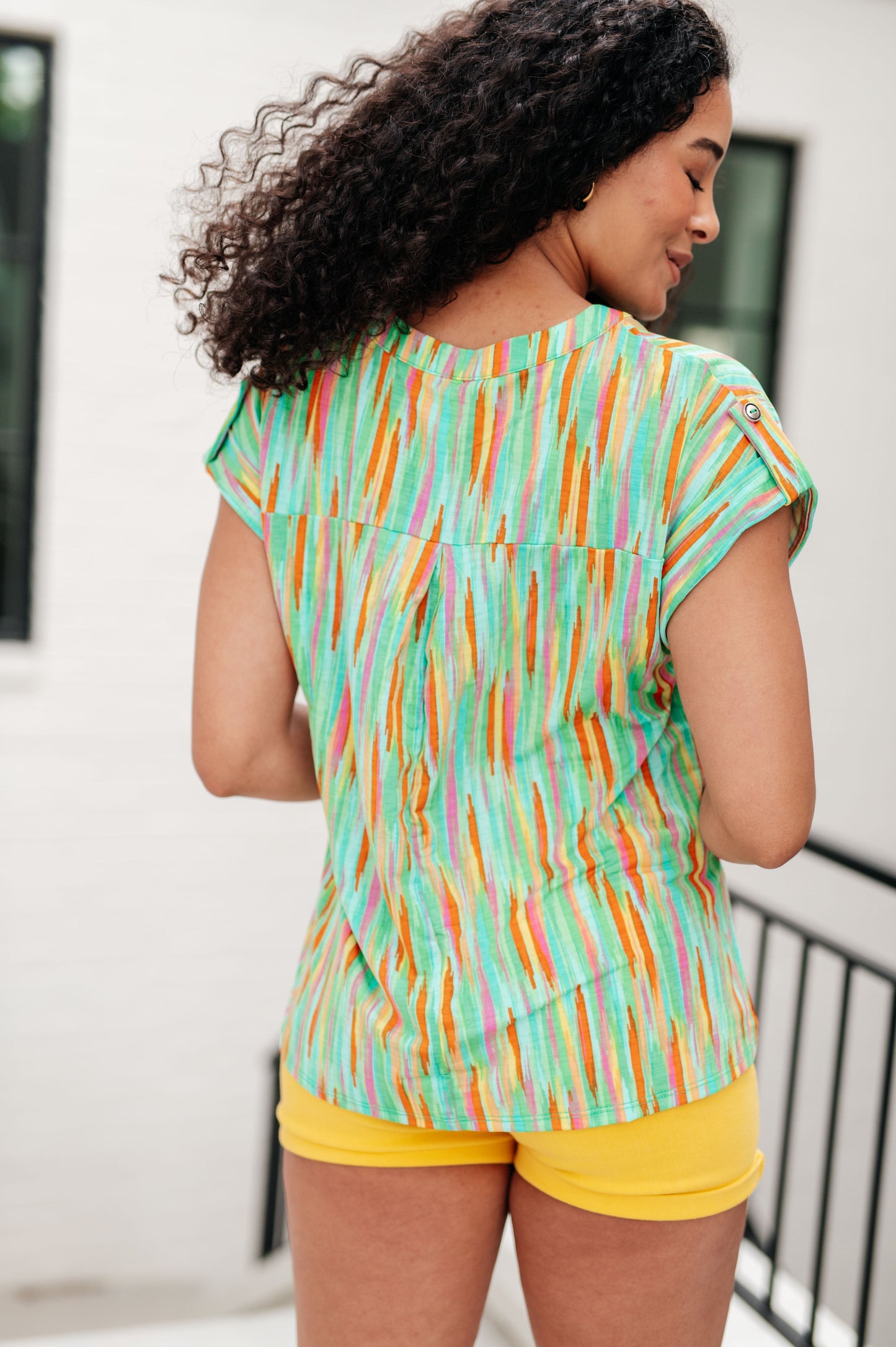 Top Lizzy de manga casquillo a rayas multicolor lima y esmeralda