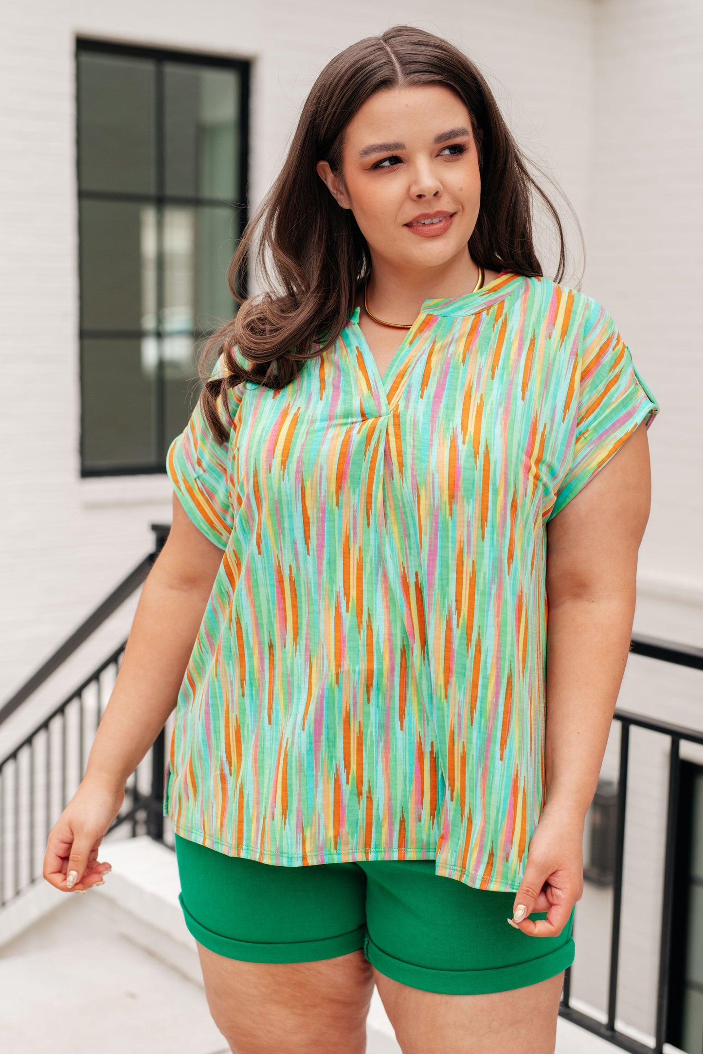 Top Lizzy de manga casquillo a rayas multicolor lima y esmeralda