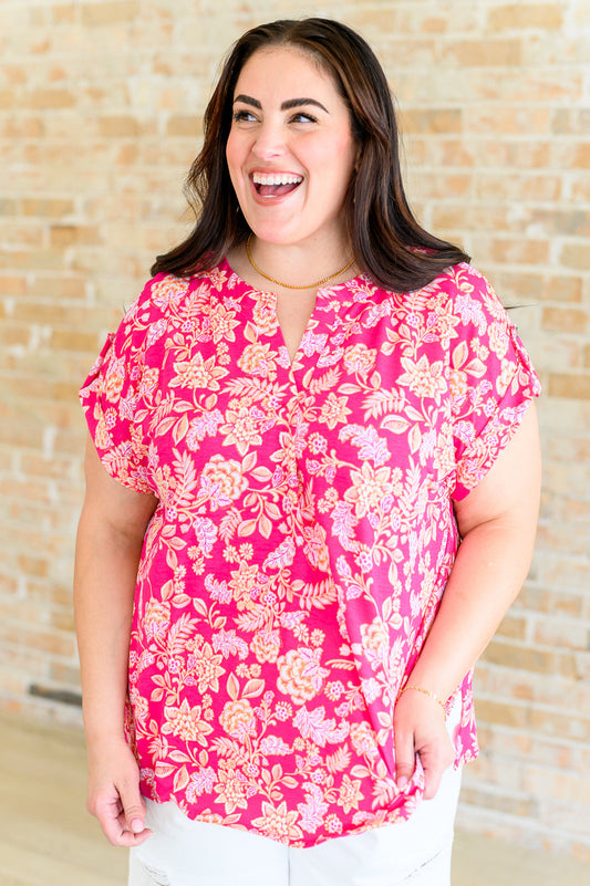 Top Lizzy de manga casquillo con estampado floral en rosa y melocotón